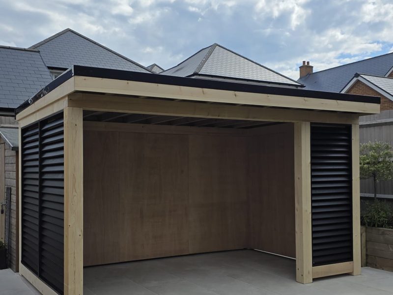 Bespoke garden room louvred screen on the finished patio