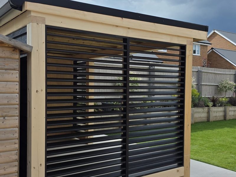 Close view of the adjustable louvred pergola screens